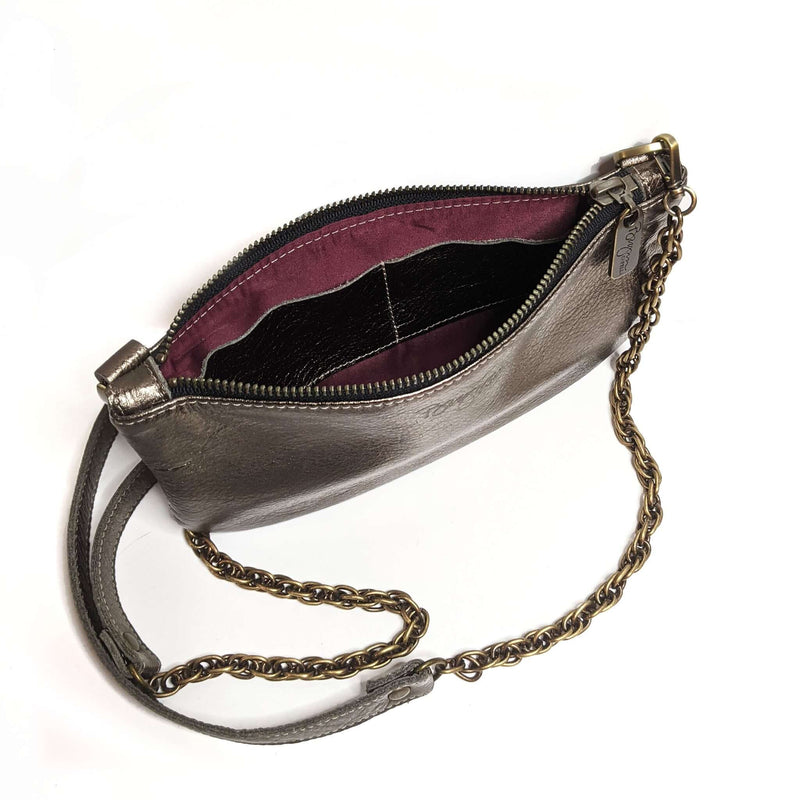 Interior view of Cher Chain Crossbody bag in Antique Pewter, featuring a metallic leather bag design with chain strap.