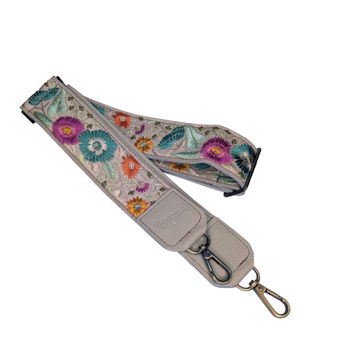 Floral embroidered strap with cream leather end and metal hook, guitar purse strap