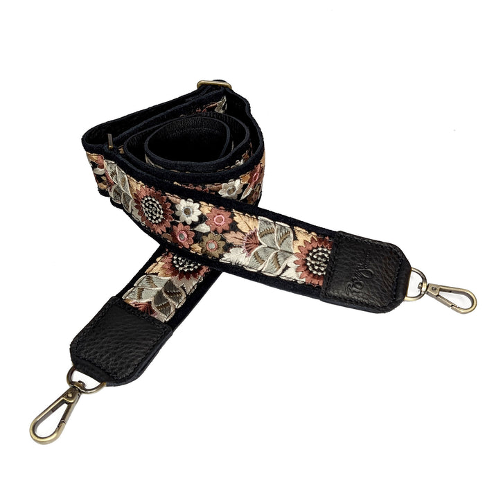 Floral patterned guitar purse strap with black leather accents
