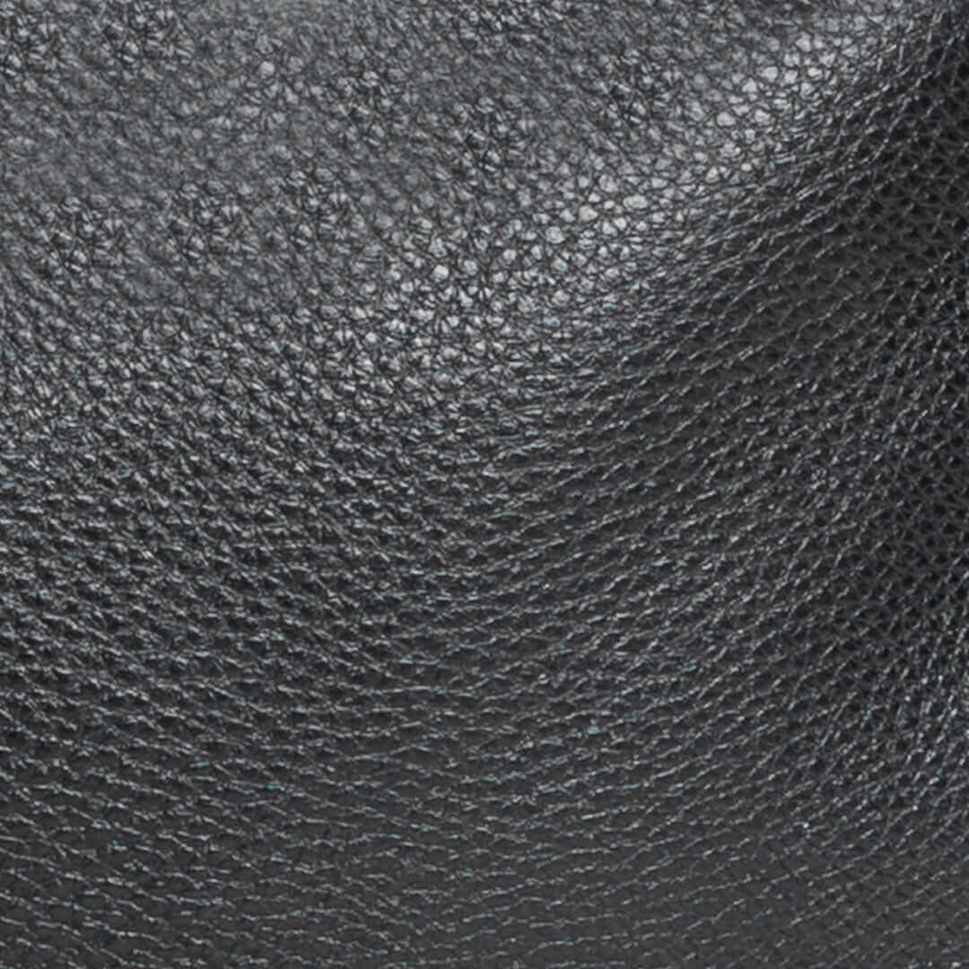 Close-up of black full grain semi-aniline leather called Noche