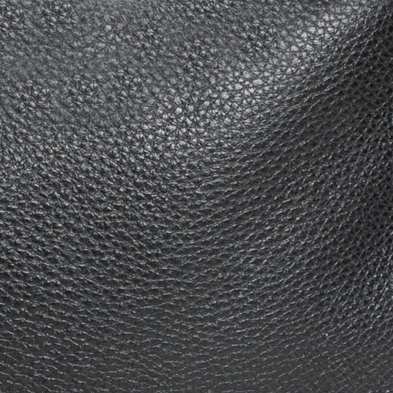 Close-up of the textured black leather used in the Original Lauren 6-in-1 leather crossbody bag.