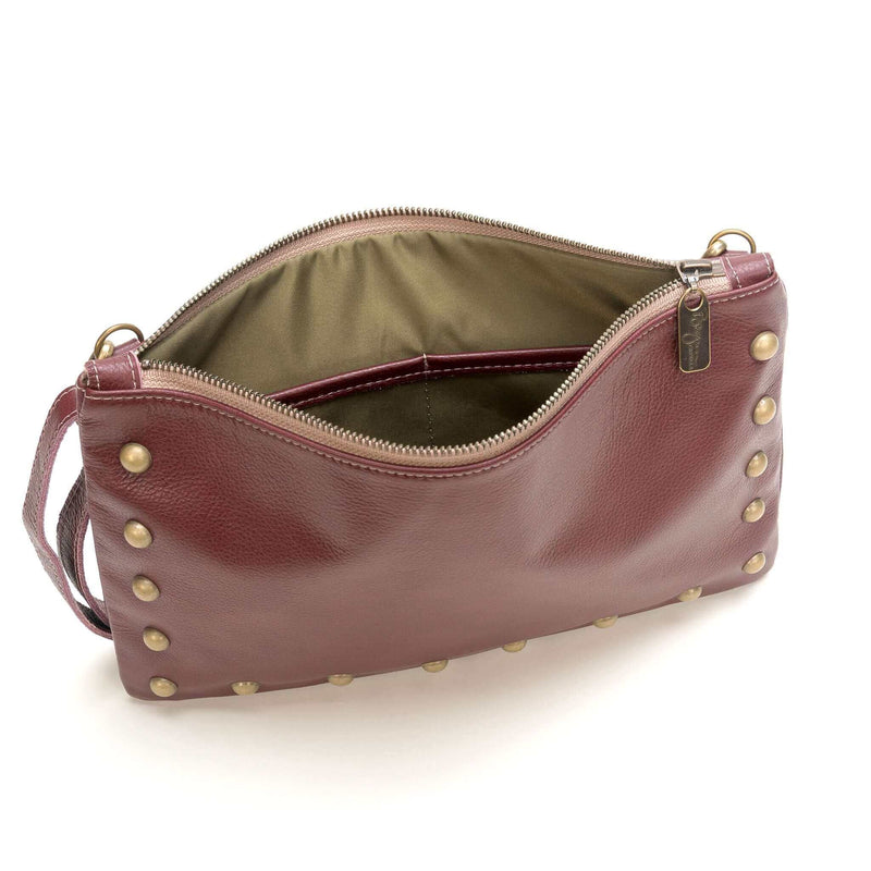 Interior of studded bag in plum full-grain leather small crossbody bag with detachable strap