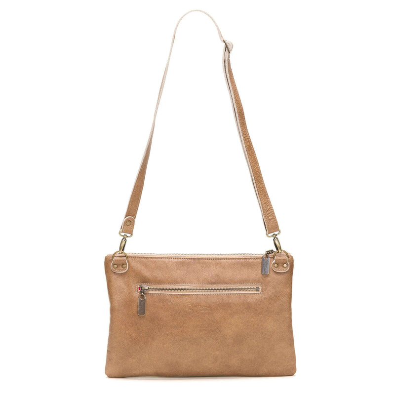 Back view of studded bag in golden tan full-grain leather convertible clutch-to-crossbody with detachable strap