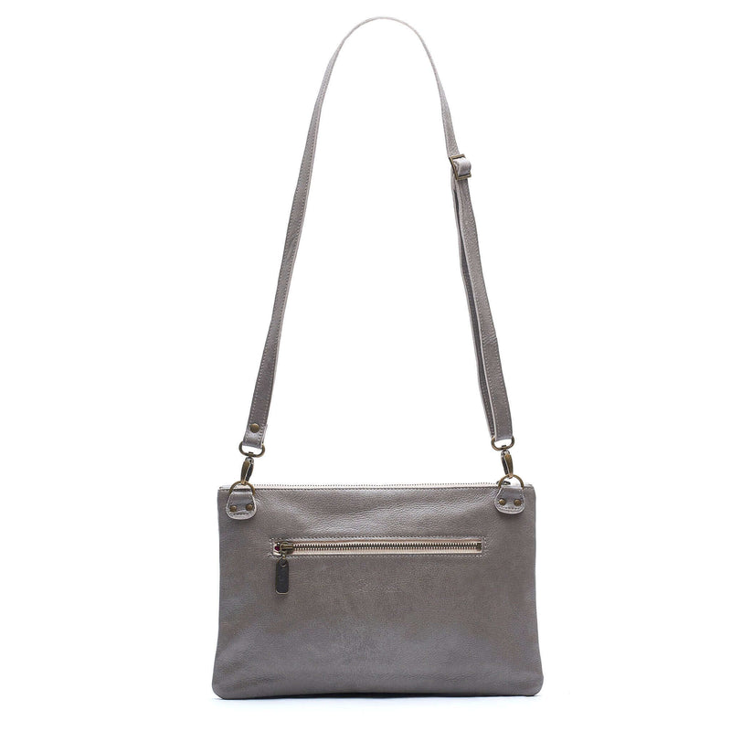 Back view of Studded bag in light grey full-grain leather convertible clutch-to-crossbody with detachable strap