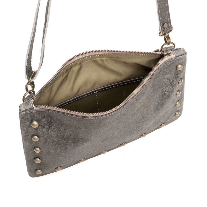 Interior of studded bag in light charcoal full-grain leather small crossbody bag with detachable strap