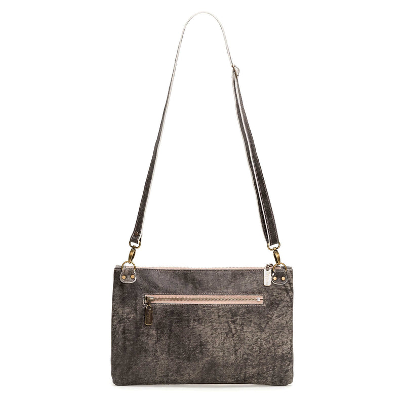 Back view of studded bag in light charcoal full-grain leather convertible clutch-to-crossbody with detachable strap