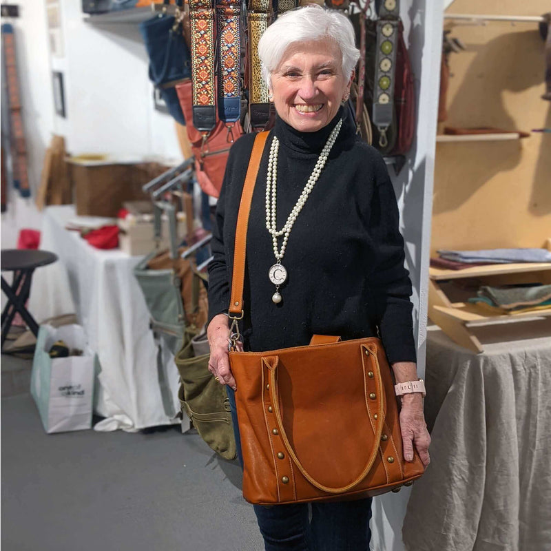 The perfect leather tote bag, whiskey rust, lifestyle, Brynn Capella, made in the usa, ugc